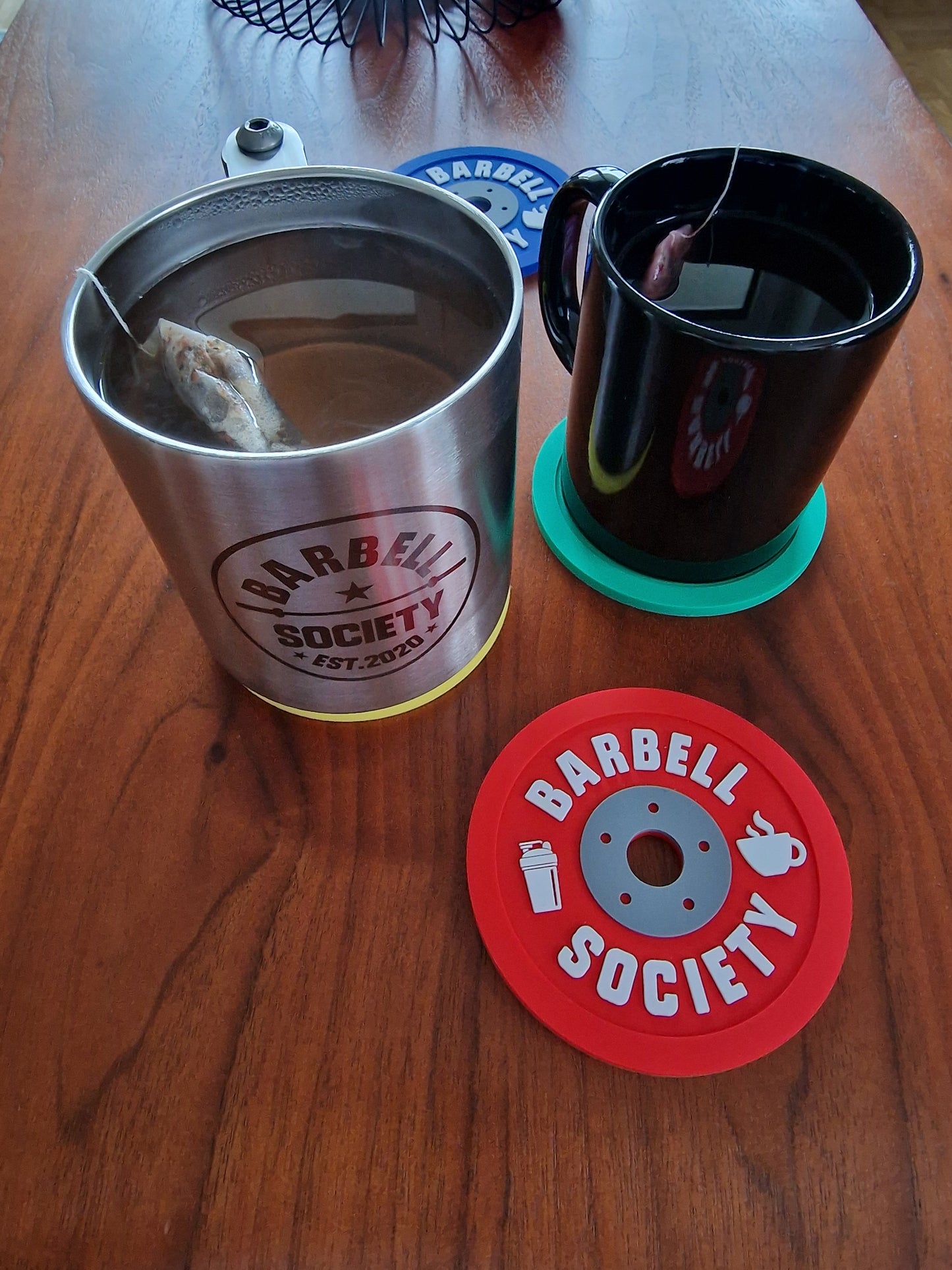 Coasters in weightlifting plate style